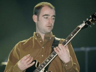 Paul "Bonehead" Arthurs de Oasis diagnosticado con cáncer